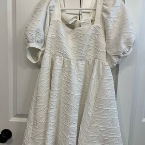 Free People Size Small White Dress with  bow and beautiful designs